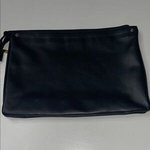A Bellucci genuine leather accessories clutch bag